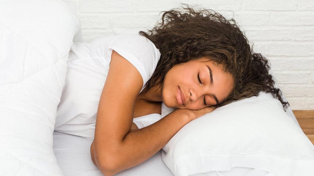 Woman sleeping according the the sleep guide